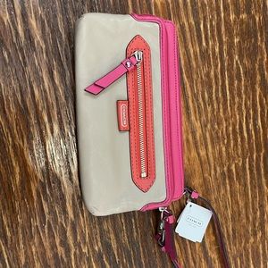 Coach wristlet tan and pink